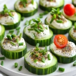 Für diese leckeren Alles Bagel Gurkenbissen benötigst du einige frische und gesunde Zutaten. Hier ist die Liste: - 1 große Gurke - 225 g Frischkäse, weich gemacht - 60 g griechischer Joghurt, ungesüßt - 1 Esslöffel Zitronensaft - 2 Teelöffel Knoblauchpulver - 1 Esslöffel frischer Dill, gehackt - 2 Teelöffel Alles Bagel Gewürz Diese Zutaten ergeben eine cremige und geschmackvolle Mischung. Die Gurke bringt Frische, während der Frischkäse und der Joghurt die Basis bilden. Du kannst deine Gurkenbissen noch schöner gestalten, indem du sie garnierst. Hier sind einige Optionen: - Kirschtomaten, halbiert - Frische Schnittlauch, gehackt Die Kirschtomaten fügen eine süße Note hinzu. Der Schnittlauch bringt einen feinen, zwiebeligen Geschmack. Jede Zutat hat ihre eigenen Vorteile: - Gurke: Sie ist kalorienarm und hydratisiert den Körper. Gurken haben viele Vitamine. - Frischkäse: Er liefert Proteine und hat weniger Fett als viele andere Käsesorten. - Griechischer Joghurt: Er ist reich an Probiotika, die gut für die Verdauung sind. - Dill: Er hat Antioxidantien und verbessert den Geschmack. - Knoblauchpulver: Es kann das Immunsystem stärken und hat viele gesundheitliche Vorteile. - Alles Bagel Gewürz: Es enthält oft Sesam und Mohn, die reich an Nährstoffen sind. Diese Zutaten machen deine Gurkenbissen nicht nur lecker, sondern auch gesund. Du kannst sie jederzeit genießen, ohne ein schlechtes Gewissen zu haben. Zuerst wasche die Gurke gründlich. Das hilft, Schmutz zu entfernen. Danach schneide die Gurke in etwa 1,5 cm dicke Runden. So erhältst du perfekte Scheiben für deine Bissen. Lege die Gurkenscheiben beiseite. Sie sind die Basis für die leckeren Häppchen. Nimm eine Schüssel und füge den weichen Frischkäse hinzu. Dazu kommt der griechische Joghurt. Der Joghurt macht die Mischung cremiger. Jetzt gib den Zitronensaft, das Knoblauchpulver und den gehackten Dill dazu. Rühre alles gut um, bis die Mischung glatt ist. Dann füge das Alles Bagel Gewürz hinzu. Mische es gut, damit der Geschmack gleichmäßig verteilt wird. Jetzt ist es Zeit, die Bissen zusammenzustellen. Nimm eine Gurkenscheibe und trage großzügig die Frischkäsemischung darauf auf. Verwende einen kleinen Spatel oder die Rückseite eines Löffels. Toppe jede Scheibe mit einer halbierten Kirschtomate. Das bringt Farbe und zusätzlichen Geschmack. Zum Schluss streue etwas mehr Alles Bagel Gewürz obenauf. Garniere die Bissen mit gehacktem Schnittlauch. Richte die Gurkenbissen auf einer Servierplatte an. Stelle sie für etwa 15 Minuten in den Kühlschrank. So können sich die Aromen gut entfalten. Um die besten Gurkenbissen zu machen, schneide die Gurke in gleichmäßige Scheiben. Sie sollten etwa 1,5 cm dick sein. So bleibt die Gurke knackig und hält die Füllung gut. Halte die Gurke bei der Arbeit fest, damit du saubere Schnitte bekommst. Nutze ein scharfes Messer für präzise Schnitte ohne Quetschen. Das Alles Bagel Gewürz ist vielseitig. Du kannst es selbst machen oder im Laden kaufen. Eine einfache Mischung besteht aus Sesam, Mohn, Knoblauchpulver und Zwiebelstückchen. Probiere auch andere Kräuter wie Oregano oder Paprika für eine neue Note. Sei kreativ! Mische verschiedene Gewürze, um deiner Version mehr Geschmack zu geben. Die Konsistenz ist wichtig für die Gurkenbissen. Stelle sicher, dass der Frischkäse weich und glatt ist. Das macht das Mischen einfach. Wenn die Mischung zu dick ist, füge etwas mehr griechischen Joghurt hinzu. So wird die Mischung cremiger und leichter zu verteilen. Achte darauf, gut zu rühren, damit alle Zutaten gleichmäßig vermischt sind. {{image_4}} Eine tolle Variante sind Gurkenbissen mit Avocado. Ersetze etwas Frischkäse durch pürierte Avocado. Sie bringt eine cremige Textur und einen tollen Geschmack. Das ist gesund und lecker. Du kannst auch etwas Limettensaft hinzufügen. Das gibt einen frischen Kick. Avocado hat viele Nährstoffe, die gut für dich sind. Wenn du vegan essen möchtest, gibt es gute Alternativen. Verwende einen pflanzlichen Frischkäse. Er hat einen ähnlichen Geschmack und eine ähnliche Konsistenz. Du kannst auch Cashew-Creme ausprobieren. Sie ist einfach zu machen. Dazu weiche Cashewkerne ein und püriere sie mit Wasser und etwas Zitronensaft. Das ist eine tolle, cremige Basis. Manchmal will man den Frischkäse nicht verwenden. Das ist kein Problem! Du kannst griechischen Joghurt allein verwenden. Er ist leicht und hat einen frischen Geschmack. Eine andere Option ist Quark. Er hat eine dicke Konsistenz und einen milden Geschmack. Probiere verschiedene Kombinationen. So findest du die für dich beste Mischung. Wenn du deine Alles Bagel Gurkenbissen aufbewahren möchtest, ist der Kühlschrank der beste Ort. Lege die Bissen in einen luftdichten Behälter. So bleibt die Frische erhalten. Achte darauf, die Bissen nicht übereinander zu stapeln, um Druck zu vermeiden. So bleiben sie schön und frisch. Die Gurkenbissen halten sich bis zu drei Tage im Kühlschrank. Nach diesem Zeitraum kann der Geschmack nachlassen. Achte darauf, sie gut abzudecken. Wenn sie matschig oder schlecht riechen, solltest du sie nicht mehr essen. Frische ist hier wichtig. Du kannst die Frischkäsemischung bis zu zwei Tage im Voraus zubereiten. Lagere sie in einem luftdichten Behälter im Kühlschrank. Schneide die Gurken kurz vor dem Servieren. So bleiben sie knackig und frisch. Wenn du Zeit sparen willst, bereite die Bissen am Vortag vor. So hast du mehr Zeit für deine Gäste. Dieses Rezept ergibt 12 leckere Gurkenbissen. Ideal für einen Snack oder als Vorspeise. Wenn du mehr Gäste hast, kannst du die Menge leicht verdoppeln. Mehr Bissen bedeuten mehr Freude! Ja, du kannst diese Gurkenbissen perfekt für eine Party vorbereiten. Du kannst sie bis zu 2 Stunden im Voraus machen. Achte darauf, sie im Kühlschrank zu lagern. So bleiben sie frisch und kühl. Falls du keinen Frischkäse magst, gibt es tolle Alternativen. Du kannst Hummus oder Avocado verwenden. Beide Optionen bringen einen neuen Geschmack. Sie sind auch gesund und cremig. Wenn du eine vegane Option suchst, nimm pflanzlichen Frischkäse. Diese Anleitung zeigt dir, wie du leckere Alles Bagel Gurkenbissen machst. Wir haben die Hauptzutaten und ihre Vorteile besprochen. Außerdem gab es eine Schritt-für-Schritt-Anleitung, Tipps für die Zubereitung und Varianten, um das Rezept anzupassen. Denke daran, wie wichtig die frischen Zutaten sind. Du kannst mit verschiedenen Gewürzen und Füllungen kreativ werden. So gelingt dir ein einzigartiger Snack für jeden Anlass. Experimentiere und finde deinen persönlichen Favoriten!