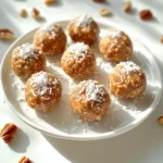 Die Hauptzutaten sind einfach und gesund. Sie sorgen für Geschmack und Nährstoffe. Hier sind die wichtigsten Zutaten: - 1 Tasse Haferflocken - 1/2 Tasse Mandelbutter (oder eine andere Nussbutter) - 1/4 Tasse Honig oder Ahornsirup - 1 Teelöffel Vanilleextrakt - Eine Prise Salz Diese Zutaten bilden die Basis für die Energie Bällchen. Die Haferflocken geben dir Energie, während die Nussbutter gut für die Proteine ist. Honig oder Ahornsirup süßen die Bällchen perfekt. Die Gewürze machen die Bällchen besonders lecker. Sie bringen den Vanille Chai Geschmack. Hier sind die Gewürze, die du brauchst: - 1 Teelöffel gemahlener Zimt - 1/2 Teelöffel gemahlener Ingwer - 1/2 Teelöffel Kardamom - 1/4 Teelöffel schwarzer Pfeffer - 1/4 Teelöffel Muskatnuss Zimt und Ingwer sind die Hauptgewürze hier. Sie geben Wärme und Tiefe. Kardamom fügt eine süßliche Note hinzu, während schwarzer Pfeffer für einen kleinen Kick sorgt. Für mehr Textur kannst du einige optionale Zutaten hinzufügen. Diese machen die Bällchen noch interessanter. Hier sind die Optionen: - 1/2 Tasse gehackte Nüsse (Mandeln oder Walnüsse) - 1/4 Tasse ungesüßte Kokosraspeln (optional) Gehackte Nüsse bringen Crunch und gesunde Fette. Kokosraspeln geben ein tropisches Flair. Füge sie hinzu, wenn du magst! Beginne mit einer großen Rührschüssel. Gib die Haferflocken hinein. Füge dann die Gewürze hinzu: gemahlenen Zimt, Ingwer, Kardamom, schwarzen Pfeffer und Muskatnuss. Vergiss nicht eine Prise Salz. Mische alles gut. So verteilen sich die Gewürze gleichmäßig. Ein guter Mix sorgt für einen tollen Geschmack. In einer separaten Schüssel nimm die Mandelbutter. Gib den Honig oder den Ahornsirup dazu. Füge den Vanilleextrakt hinzu. Rühre alles zusammen, bis die Mischung glatt ist. Die feuchten Zutaten bringen die Trockenmasse zusammen. Das verbindet die Geschmäcker gut. Jetzt ist es Zeit zu formen. Gib die feuchte Mischung zu den trockenen Zutaten. Füge die gehackten Nüsse und Kokosraspeln dazu. Rühre alles gut um, bis eine klebrige Masse entsteht. Nimm kleine Portionen und forme sie zu Bällchen. Die Bällchen sollten etwa 2,5 cm groß sein. Lege sie auf ein mit Backpapier belegtes Backblech. Stelle das Blech für mindestens 30 Minuten in den Kühlschrank. So werden die Bällchen fest. Nach dem Kühlen kannst du sie sofort genießen! Um die perfekte Konsistenz für deine Vanille Chai Energie Bällchen zu erreichen, ist das Mischen der Zutaten der Schlüssel. Beginne mit den trockenen Zutaten. Mische die Haferflocken, Gewürze und Salz gut. So verteilen sich die Aromen gleichmäßig. Dann mische die feuchten Zutaten in einer separaten Schüssel. Wenn die Mandelbutter und der Honig gut kombiniert sind, gib sie zu den trockenen Zutaten. Rühre alles gut um, bis die Mischung klebrig ist. Wenn die Masse zu trocken erscheint, füge etwas mehr Honig oder Nussbutter hinzu. Zu feucht? Dann gib mehr Haferflocken hinzu. Um die Frische deiner Energie Bällchen zu bewahren, lagere sie in einem luftdichten Behälter. Du kannst sie bis zu einer Woche im Kühlschrank aufbewahren. Kühlung hilft, ihre Form zu halten und die Aromen zu intensivieren. Wenn du die Bällchen länger aufbewahren möchtest, kannst du sie auch einfrieren. Lege sie einfach in einen Gefrierbeutel. Sie halten bis zu drei Monate. Wenn du sie essen möchtest, lasse sie einfach bei Raumtemperatur auftauen. Für eine ansprechende Präsentation serviere die Bällchen auf einem schönen Teller. Du kannst sie mit einer Prise Kokosraspeln dekorieren. Eine Zimtstange macht das Ganze noch schöner. Wenn du Gäste hast, richte die Bällchen in kleinen Schalen an. Das sieht toll aus und macht sie leicht zu greifen. Du kannst auch einen Dip aus Joghurt oder Honig servieren. So bekommen die Bällchen einen zusätzlichen Kick. {{image_4}} Wenn du keine Mandelbutter magst, kannst du andere Nussbutter verwenden. Erdnussbutter ist eine tolle Wahl. Sie gibt den Bällchen einen nussigen Geschmack. Cashewbutter ist auch lecker und cremig. Du kannst sogar Sonnenblumenbutter nutzen, wenn du Allergien hast. Lust auf mehr Geschmack? Füge Schokoladenstückchen hinzu. Sie bringen eine süße Note. Auch getrocknete Früchte wie Cranberries oder Aprikosen passen gut. Du kannst auch einen Teelöffel Matcha hinzufügen. Das gibt einen tollen Farb- und Geschmacksakzent. Um die Bällchen vegan zu machen, ersetze den Honig durch Ahornsirup. Das schmeckt genauso gut. Für glutenfreie Optionen achte darauf, dass die Haferflocken glutenfrei sind. So kannst du sie ohne Sorge genießen. Diese kleinen Anpassungen machen die Bällchen vielseitig und für alle geeignet. Die Vanille Chai Energie Bällchen sind nicht nur lecker, sondern auch nahrhaft. Jede Portion enthält etwa 100 Kalorien. Die Makronährstoffe setzen sich wie folgt zusammen: - Fett: 5 g - Kohlenhydrate: 10 g - Eiweiß: 3 g Diese Snacks bieten eine gute Balance von Energie und Nährstoffen. Die Zutaten in diesen Energie Bällchen sind reich an Nährstoffen und haben viele Vorteile. - Haferflocken: Sie sind voller Ballaststoffe. Das hilft der Verdauung und gibt dir ein sattes Gefühl. - Mandelbutter: Sie liefert gesunde Fette und Eiweiß. Das hilft dir, länger aktiv zu bleiben. - Honig oder Ahornsirup: Diese natürlichen Süßstoffe geben dir einen schnellen Energieschub. - Gewürze: Zimt, Ingwer, Kardamom, schwarzer Pfeffer und Muskatnuss haben antioxidative Eigenschaften. Sie stärken dein Immunsystem. Diese Bällchen sind perfekt für aktive Menschen. Sie geben dir schnell Energie, wenn du sie brauchst. Ob vor dem Sport oder während eines langen Arbeitstags, sie sind ein toller Snack. Du kannst sie auch leicht mitnehmen. Einfach in eine Box packen und schon bist du bereit für den Tag! Die Energie Bällchen halten im Kühlschrank bis zu einer Woche. Bewahre sie in einem luftdichten Behälter auf. So bleiben sie frisch und lecker. Wenn du sie länger aufbewahren möchtest, solltest du sie einfrieren. Ja, du kannst die Bällchen einfrieren. Leg sie einfach in einen gefrierfesten Behälter. Sie bleiben bis zu drei Monate haltbar. Achte darauf, sie gut zu verpacken, damit sie nicht austrocknen. Lass sie einfach im Kühlschrank auftauen, wenn du sie genießen möchtest. Du kannst vorgefertigte Energie Bällchen in vielen Supermärkten oder Online-Shops finden. Achte auf die Zutatenliste. Viele Marken bieten gesunde Snacks an, die gut schmecken und nahrhaft sind. Du kannst auch lokale Märkte oder Bio-Läden besuchen, um frische Optionen zu finden. Die Vanille Chai Energie Bällchen sind einfach zuzubereiten und lecker. Wir haben die Hauptzutaten, Gewürze und optionale Zutaten besprochen. Die Schritt-für-Schritt-Anleitung macht es leicht, sie zu machen. Tipps wie die richtige Konsistenz und kreative Servierarten helfen Ihnen weiter. Außerdem gibt es viele Variationen, die Sie ausprobieren können. Diese Bällchen sind nicht nur nahrhaft, sondern auch ein toller Snack für jeden Tag. Nutzen Sie die Nährwertinformationen, um gesunde Entscheidungen zu treffen. Machen Sie diese Bällchen und genießen Sie jeden Biss!